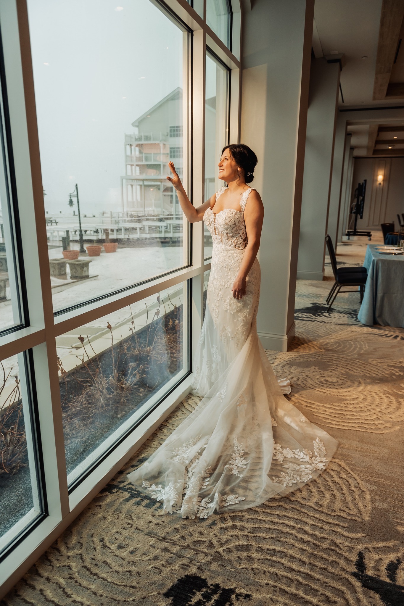 Bride in her gown at Rod 'N' Reel Resort overlooking the Chesapeake Bay